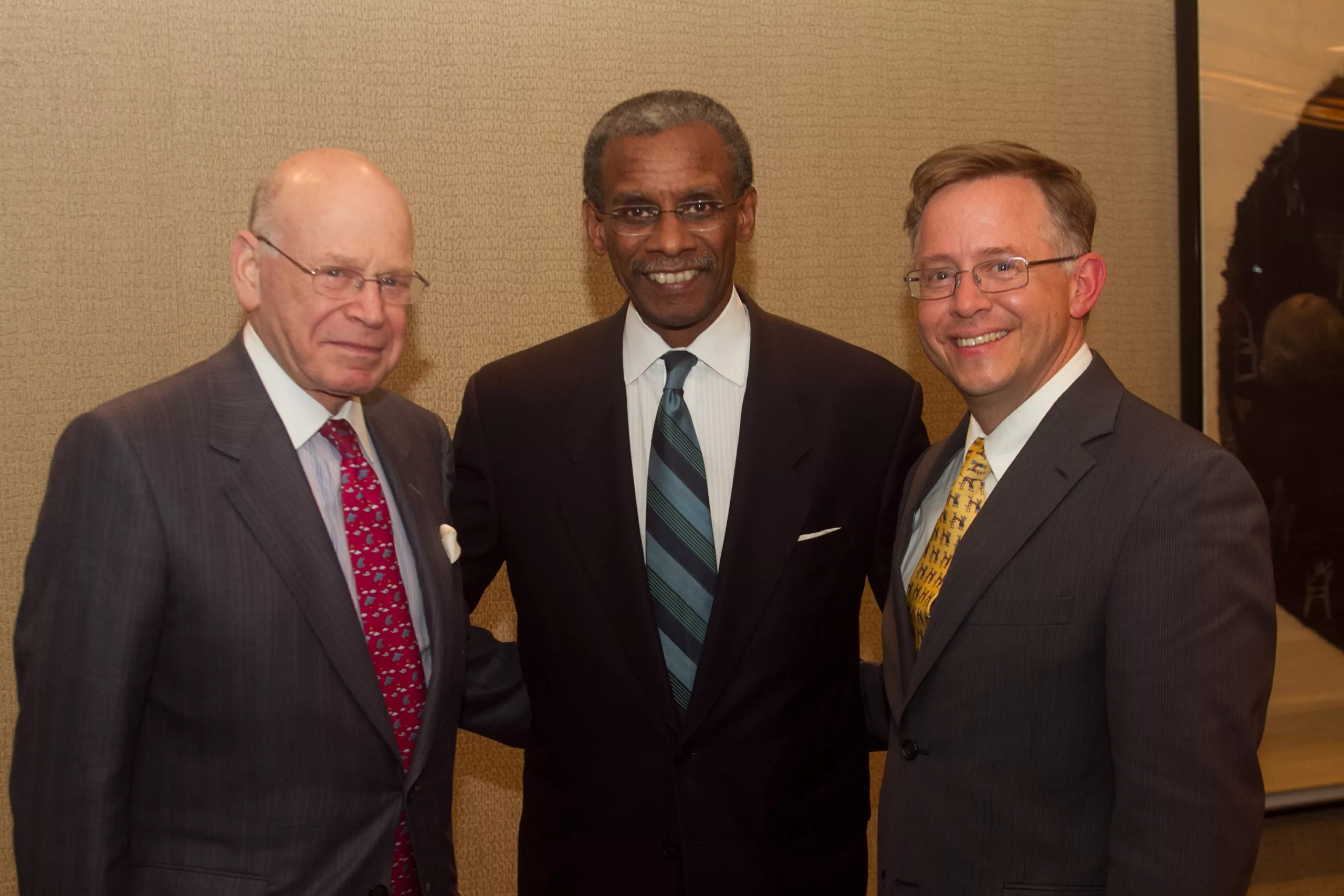 Honorees Robert Beal and  George A. Russell with MBHP Executive Director Chris Norris