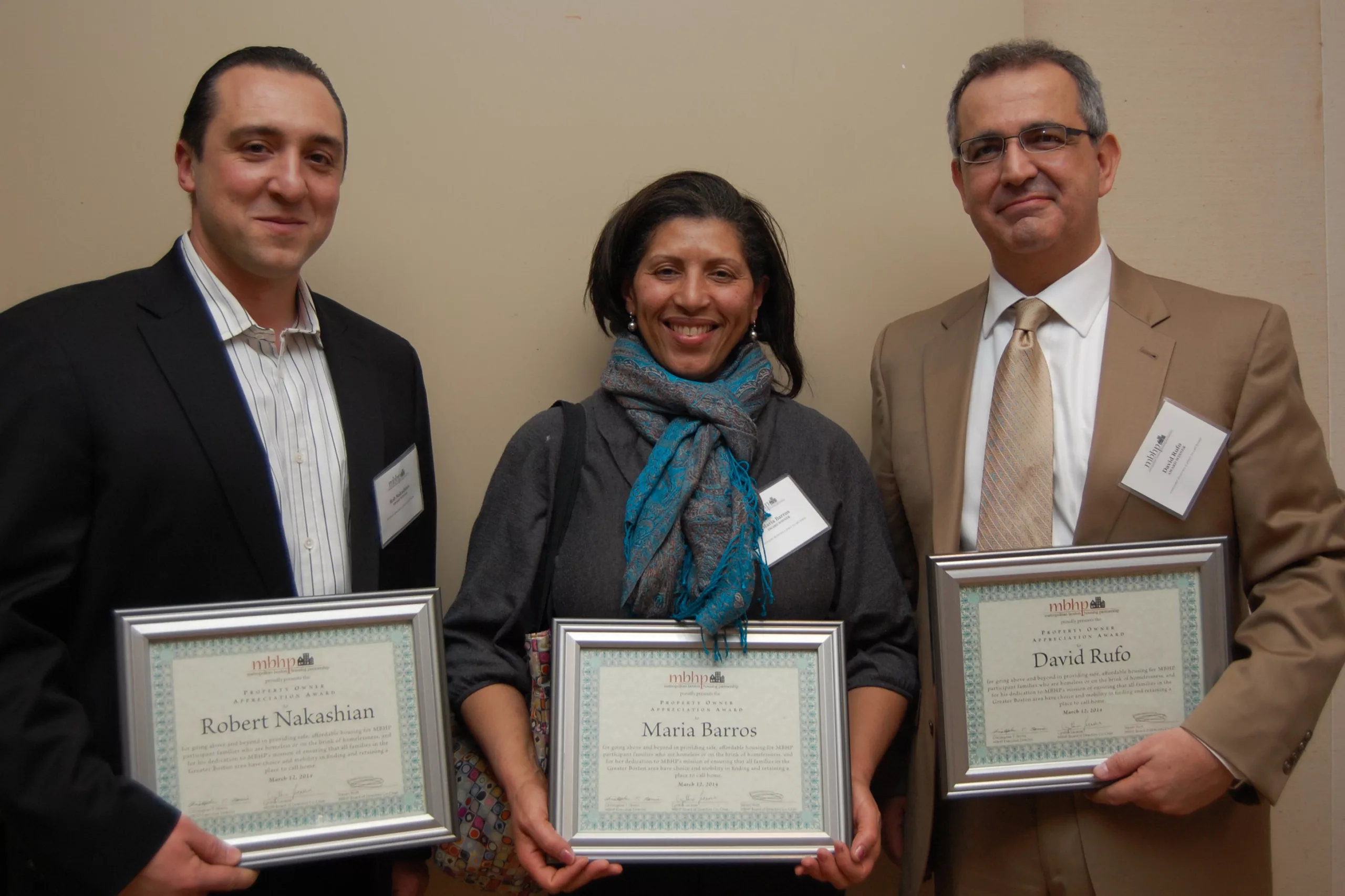 Robert Nakashian, Maria Barros and David Rufo, recipients of MBHP's Property Owner Appreciation Award